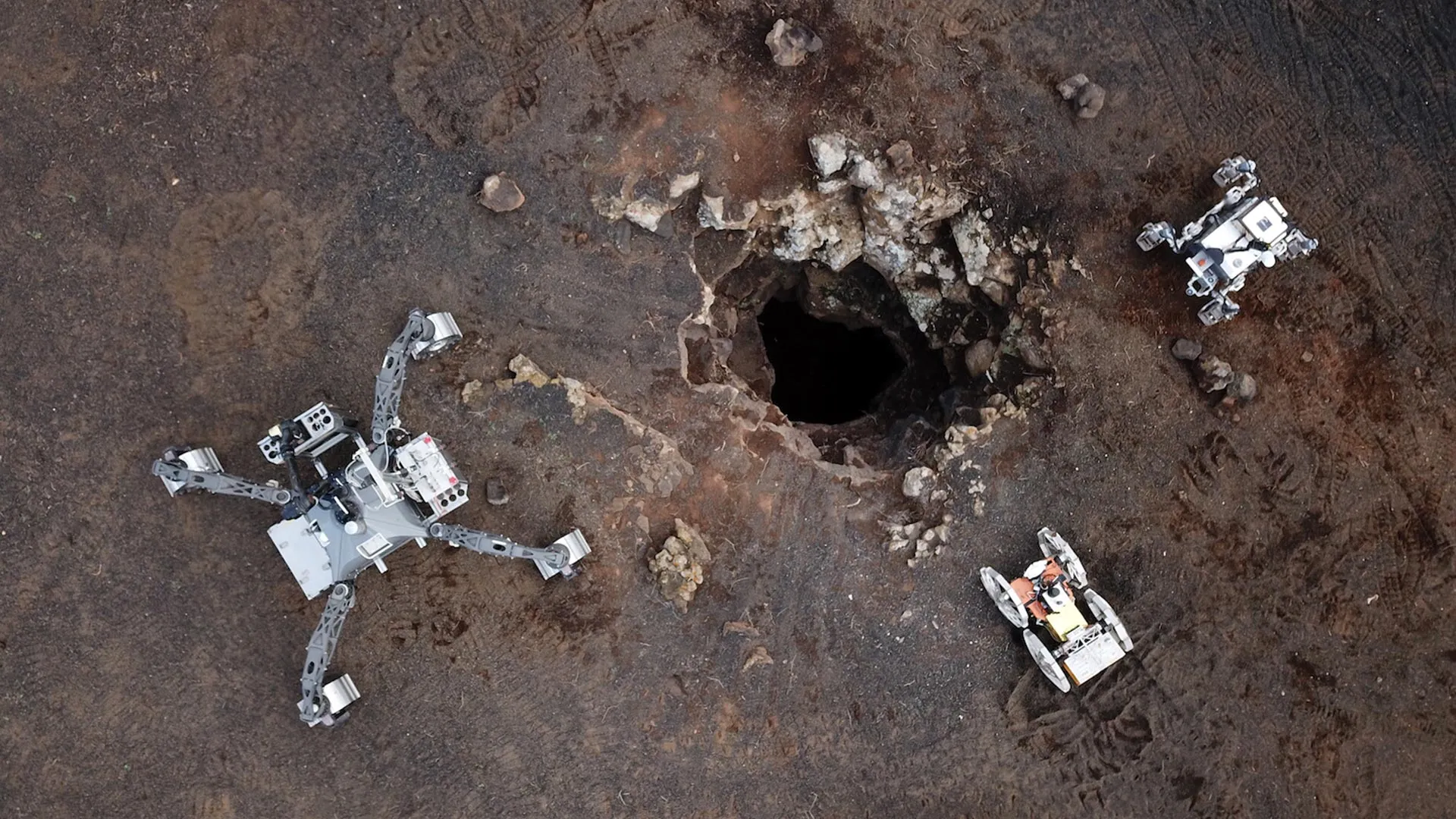 Concept illustration of future autonomous robot swarms exploring challenging environments.